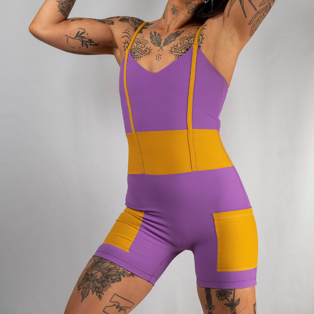 women's purple yellow activewear bodysuit with pockets