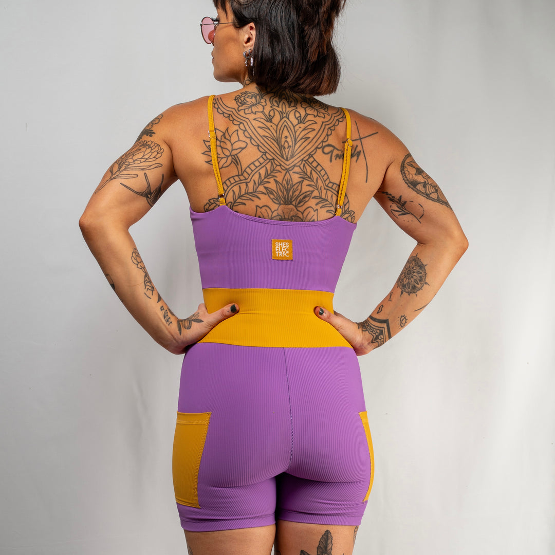 women's purple yellow activewear bodysuit with pockets