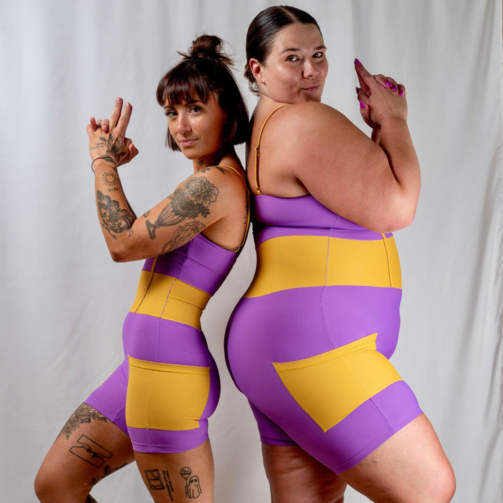 women's purple yellow activewear bodysuit with pockets